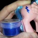 Original glitter symbol on a baby Firefly pony and matching Cartwright's glitter in #102 Electric Blue.